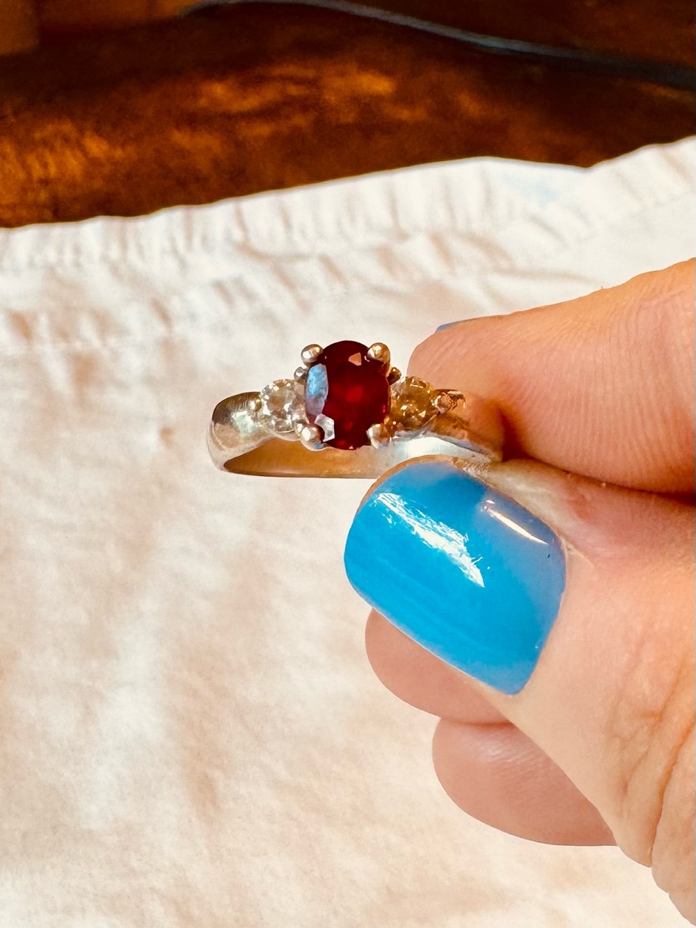 Sterling Silver Red Stone Solitaire Ring with Clear Accent Stones